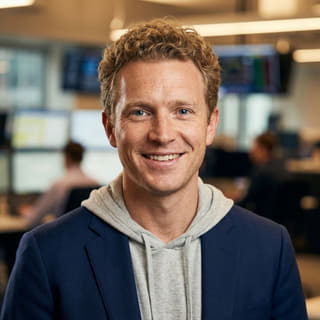 Ryan Brooks, identified as Lead Trading Analyst at Mintordom, in a profile image